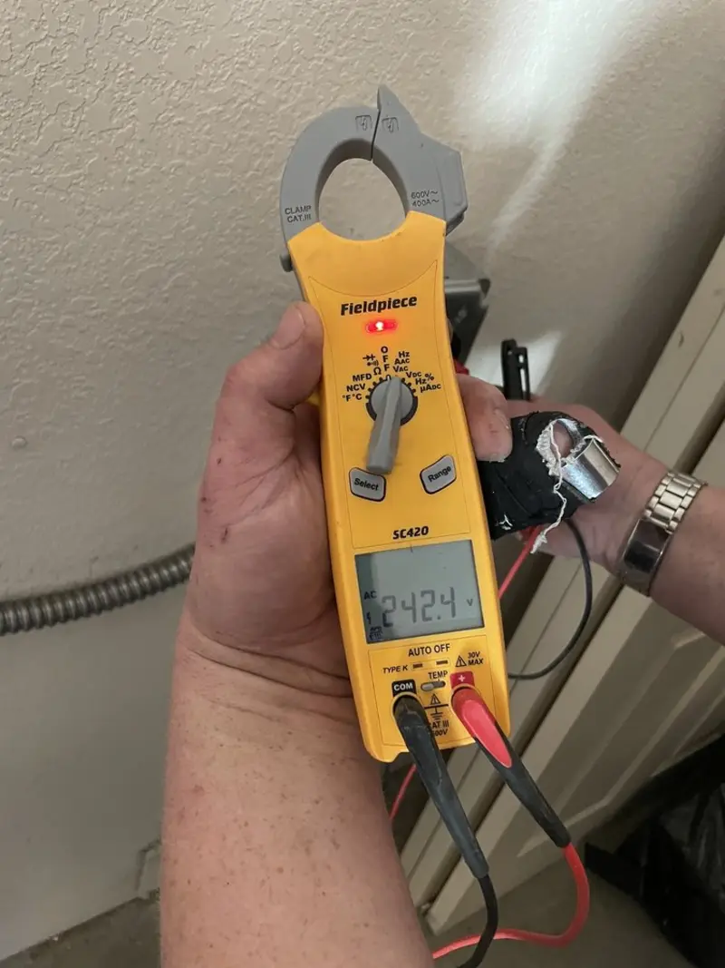 Voltage testing with clamp meter during Hot Tub / Pool Electrical Wiring in Bradford